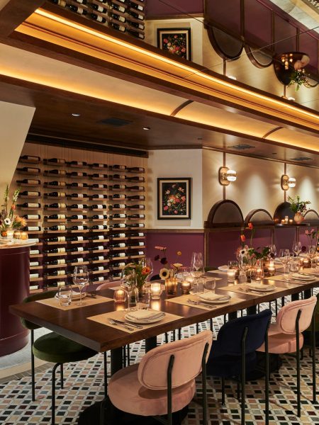 L'Artusi private dining room with wine wall and patterned tile floor